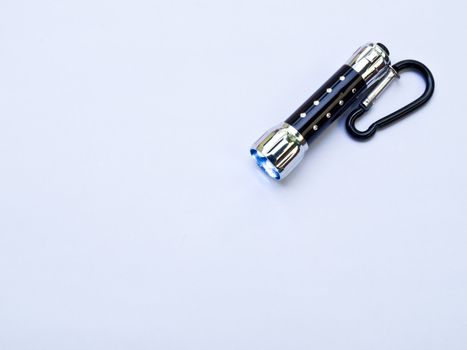 Pocket Flashlight isolated on white background