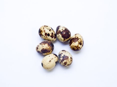 Quail eggs isolated on white background