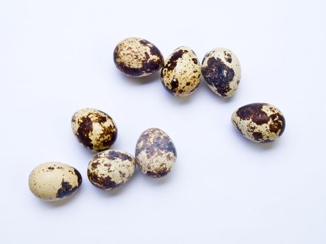 Quail eggs isolated on white background