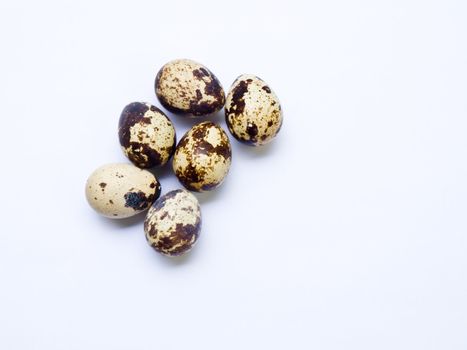 Quail eggs isolated on white background