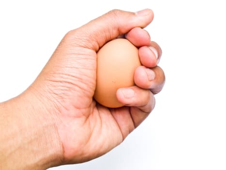 Man's hand with an egg isolated on white background