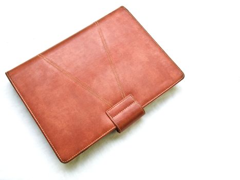Red brown leather organizer isolated by white