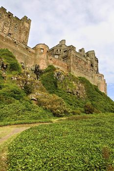 Coastal Bamburgh Castle on of the Finest Castle in Northumbria overlooks the North Sea England.