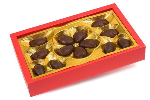 chocolates in a box on a white background
