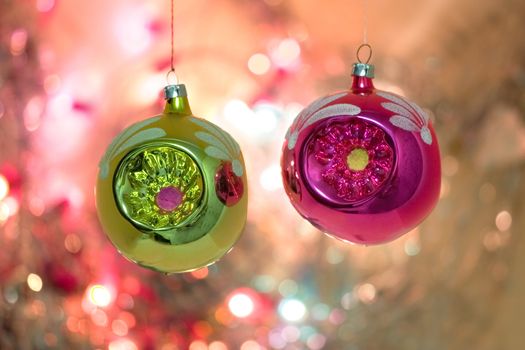 Christmas-tree decorations on a background of celebratory fires