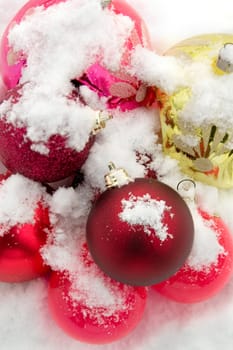 Christmas-tree decorations on a snow