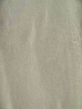 Striped textured used Khaki jeans denim fabric background