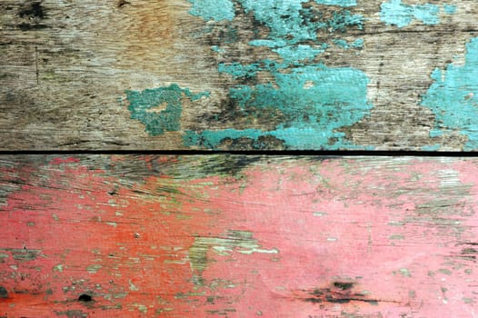 old wooden wall with the paint worn and crusty