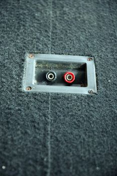 red and black loudspeaker plug holes