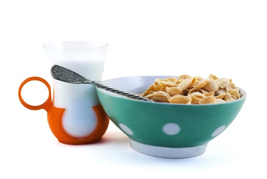 Corn-flakes and milk on a white background