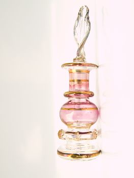 A miniature pink glass perfume bottle from Egypt