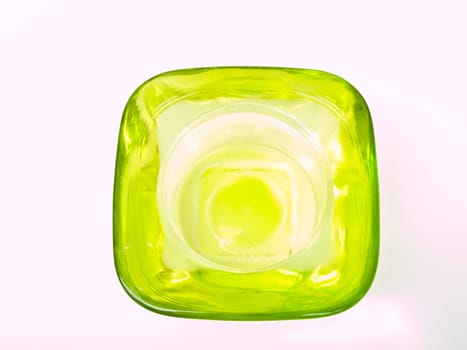 A green glass candle handle