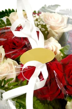 Bouquet of flowers with a blank gift lable. Write your own tekst.