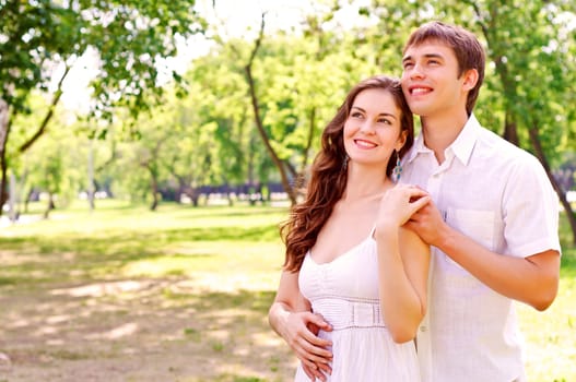 couple hugging in the park, have a good time together