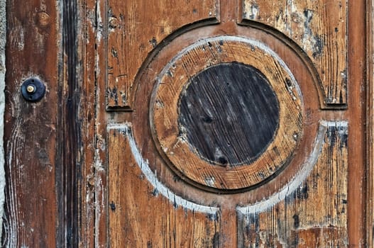 Old wooden doors detail with door bell swithch