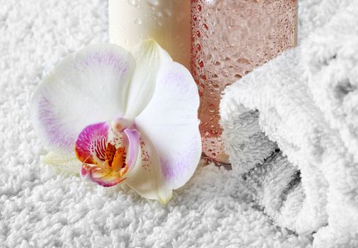 Bodycare products and a beautiful orchid