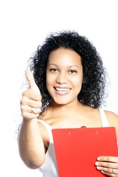 African American woman with thumbs up sign while holding red folder