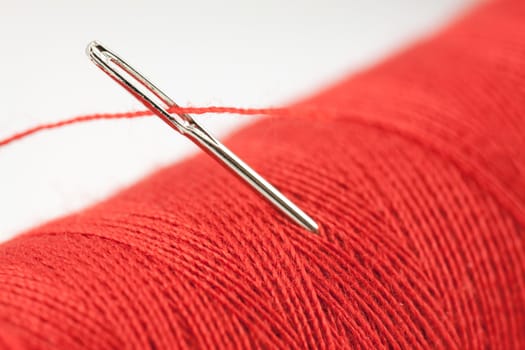 Red bobbin and needle