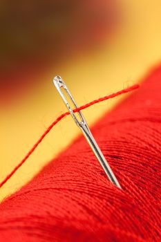 Needle and red thread
