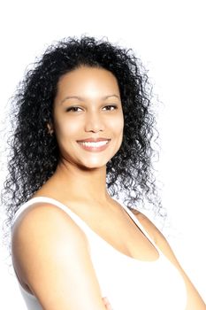 Smiling female with curly hair against the white background