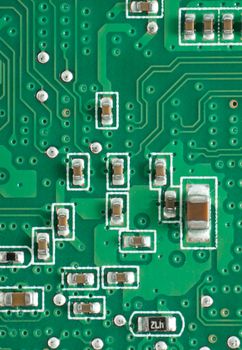 Green circuit board with components