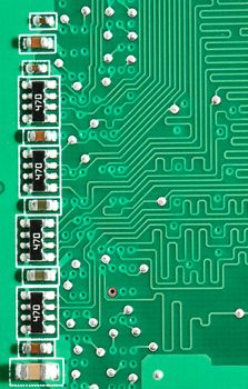 Green circuit board with components