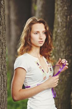 Beautiful girl with ribbons. Early morning photo