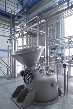 Modern machinery in a pharmaceutical production plant
