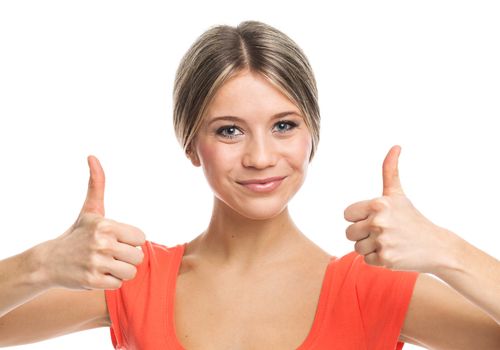 Beautiful woman showing her thumbs up, on white