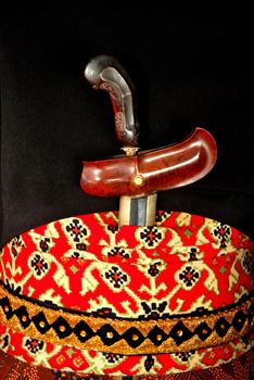 Keris is traditional weapons of Javanese Indonesia tucked behind the waist of a man