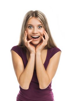 Young blond woman looking very surprised, on white