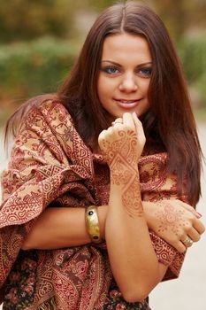 Girl with hands painted Mehandi. Picture by a henna