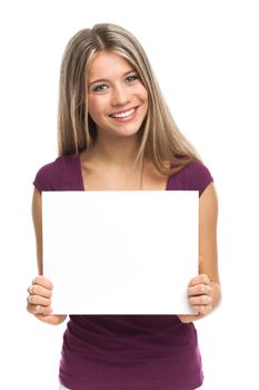 Young woman showing a white signboard, isolated on white