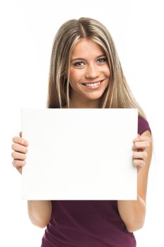 Beautiful woman showing a white signboard, isolated on white