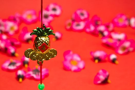 Chinese New Year ornament on red background with blurry image for festive using