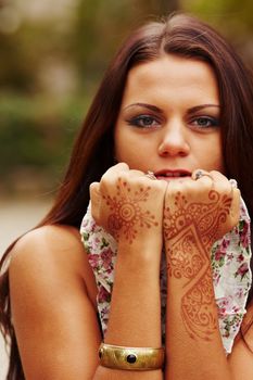 Girl with hands painted Mehandi. Picture by a henna