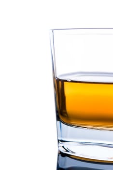 glass of cognac on a white background