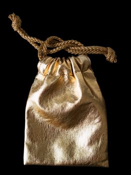 Gold Leather bag with gold rope tied on a black background