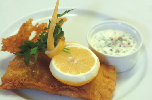 Fish `n Chips is the english british dish par excellence here with sauce gribiche in a ramekin