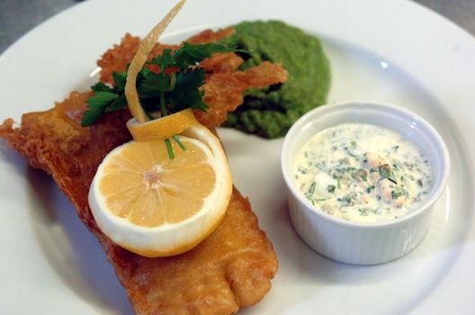 Fish `n Chips is the english british dish par excellence here with sauce gribiche in a ramekin