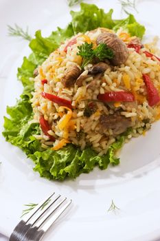 Italian risotto with mushrooms and paper for dinner