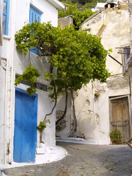 alleyway between old houses in cretan village