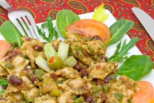 Healthy ravioli and red bean salad on a mediterranean tablecloth