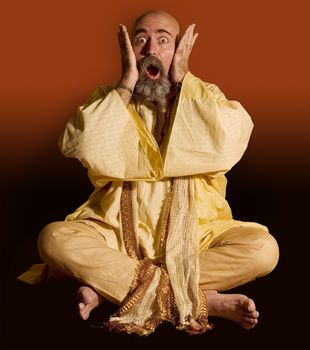 Funny guru sitting lotus style.