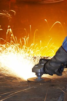 a close up picture of sparks on a grinding wheel