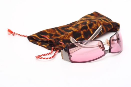 Sunglasses with protective a cover isolated on a white background