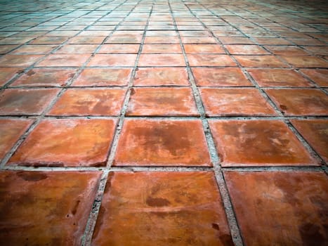 Perspective of Square red tiles floor