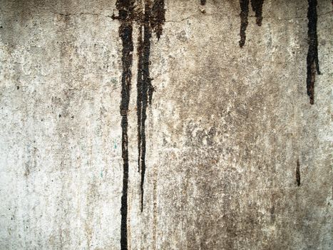 Texture of dirty black color drop on grunge old wall