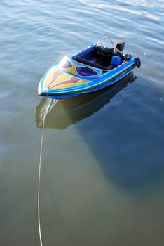 a speedboat at anchor