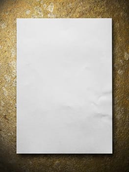 White blank paper on Gold stone texture background